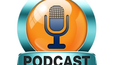 Studio microphone icon inside an orange enamel button with blue steel outline and black text that reads podcast
