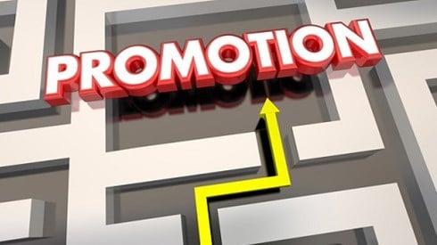 A yellow arrow in a maze that leads to the word Promotion