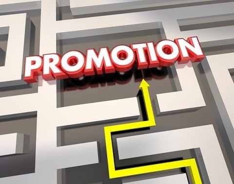A yellow arrow in a maze that leads to the word Promotion