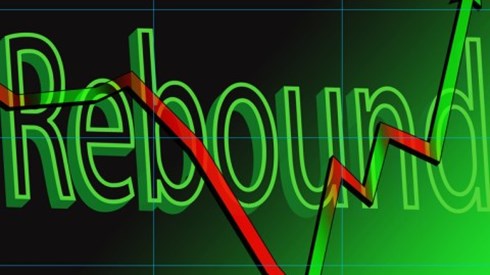 The word rebound against a green graph with a red and green arrow in front wavering down and up
