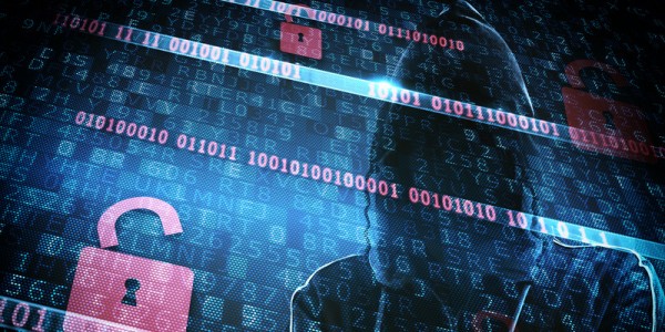 Person in a hoodie with computer code and red locks covering the image