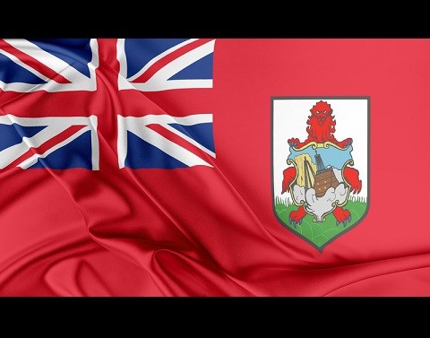 The Bermuda flag with bunched red fabric on a black background