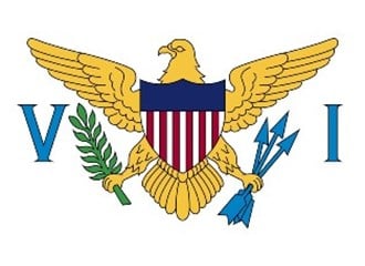 Flag of the United States Virgin Islands depicting a gold eagle holding a sprig of laurel and three arrows