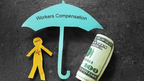 A 100 dollar bill and paper doll with a minus on head and plus on chest are under an umbrella that says Workers Compensation
